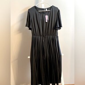 NILOUFO Boutique black pleated dress short sleeve flowy shoulder ruffles NWT